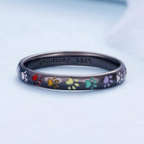 Sterling ezüst gyűrű tappancsnyomattal.