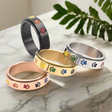 Pörgethető tappancsformájú stresszoldó gyűrű